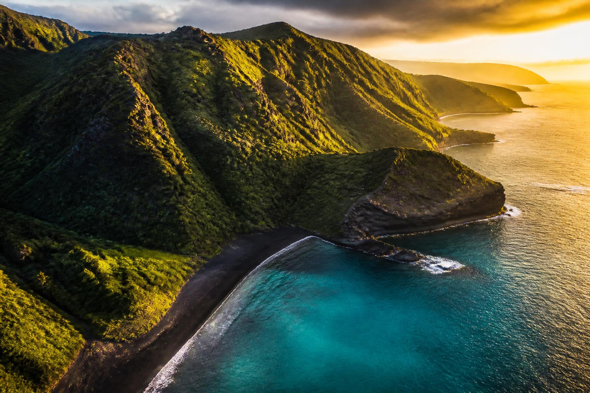 Aerial view of Oahu coastline at golden hour